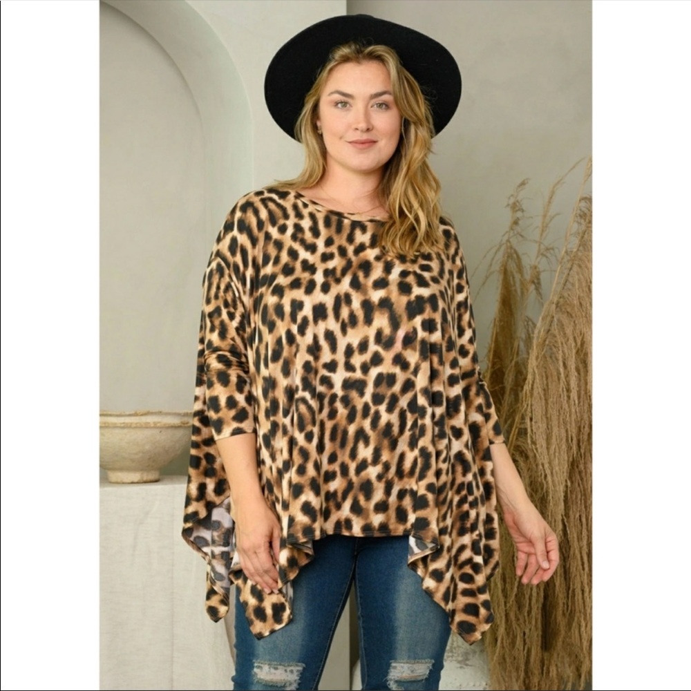 NWT PLUS SIZE (2X/3X) animal print asymmetrical top. VERY FLATTERING!! - Picture 3 of 5